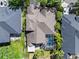 Aerial view of a well-maintained property featuring a private pool and lush landscaping at 8376 Golden Prairie Dr, Tampa, FL 33647