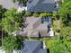 This home features a private screened pool, lush landscaping, and a large backyard perfect for entertaining at 8376 Golden Prairie Dr, Tampa, FL 33647