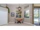 Sunlit breakfast nook with pool views, perfect for casual dining at 8376 Golden Prairie Dr, Tampa, FL 33647