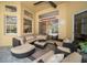 Comfortable lanai with comfortable seating and ceiling fan for enjoying the outdoors at 8376 Golden Prairie Dr, Tampa, FL 33647