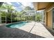 Beautiful screened in pool with ample room for entertaining at 8376 Golden Prairie Dr, Tampa, FL 33647