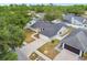 Aerial view of a home featuring a dark roof and a white privacy fence at 930 Balsamina Dr, Brandon, FL 33510