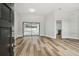 Bright and airy living room with wood floors and sliding glass doors to the pool at 930 Balsamina Dr, Brandon, FL 33510