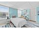 Bedroom with twin bed and ample natural light at 9790 66Th N St # 160, Pinellas Park, FL 33782