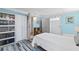 Bedroom featuring storage cabinets and natural light at 9790 66Th N St # 160, Pinellas Park, FL 33782