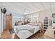 Spacious main bedroom featuring a ceiling fan, natural light, and built-in storage at 9790 66Th N St # 160, Pinellas Park, FL 33782