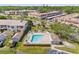 Overhead view of community pool surrounded by lush landscaping at 9950 62Nd N Ter # 316, St Petersburg, FL 33708