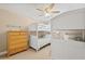 This bedroom features a bunkbed, dresser, and coastal decor at 9950 62Nd N Ter # 316, St Petersburg, FL 33708
