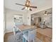 Dining area adjacent to the kitchen with nice lighting at 9950 62Nd N Ter # 316, St Petersburg, FL 33708