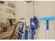 Organized storage area with wire shelving, cleaning supplies, and convenient step stool at 9950 62Nd N Ter # 316, St Petersburg, FL 33708