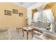 Cozy living room with decorative curtains, tile floors, and comfortable seating at 5202 Lydia Ct, Spring Hill, FL 34608