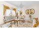 Bright living room showcasing classic decor, tile floors, and comfortable seating at 5202 Lydia Ct, Spring Hill, FL 34608