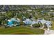 Aerial view showcasing the community's layout with the pool, clubhouse, and residential areas at 10822 Verawood Dr, Riverview, FL 33579