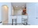 Stylish kitchen featuring counter seating and modern finishes, perfect for casual dining and entertaining at 10822 Verawood Dr, Riverview, FL 33579