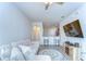Inviting living room with eat-in kitchen, entertainment center, and comfortable sectional sofa at 10822 Verawood Dr, Riverview, FL 33579