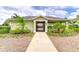 Beautiful community pool area with lush landscaping, perfect for relaxation and recreation at 10822 Verawood Dr, Riverview, FL 33579