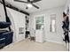 Cozy bedroom features a desk, closet storage, and natural light from a window at 1136 Serpentine S Dr, St Petersburg, FL 33705