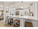 Bright kitchen boasts a sleek breakfast bar, modern appliances, and stylish pendant lights over the counter at 1136 Serpentine S Dr, St Petersburg, FL 33705
