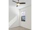 Empty bedroom shows window, neutral paint, and trim at 11412 Autumn Leaf Way, Bradenton, FL 34212
