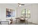 Bright office space showcasing a modern desk, chair, and window with natural light at 11412 Autumn Leaf Way, Bradenton, FL 34212