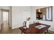 Cozy home office with a stylish desk and decor, perfect for remote work or study at 11412 Autumn Leaf Way, Bradenton, FL 34212