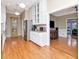 Spacious kitchen with white cabinets, stainless steel appliances, and hardwood floors at 1403 W Watrous Ave, Tampa, FL 33606