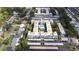 Aerial view of the building with pool at 1706 Belleair Forest Dr # 336, Belleair, FL 33756