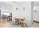 Cozy breakfast nook featuring a round table with two chairs, set in a well-lit space at 1706 Belleair Forest Dr # 336, Belleair, FL 33756