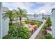 Lush courtyard featuring a walking path at 1706 Belleair Forest Dr # 336, Belleair, FL 33756