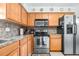 Well-equipped kitchen with stainless steel appliances, ample cabinet space, and modern amenities at 1706 Belleair Forest Dr # 336, Belleair, FL 33756