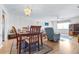 Comfortable living space with wood floors, neutral walls, and plenty of natural light at 1706 Belleair Forest Dr # 336, Belleair, FL 33756