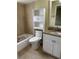 Bathroom with updated vanity, decorative tile and new fixtures at 1809 Driftwood N Cir, Oldsmar, FL 34677