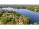 Aerial view of the property and lake showing home's location and proximity to the water at 18132 Oakdale Rd, Odessa, FL 33556