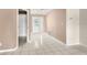 Bright foyer with tiled flooring, neutral paint, and an entry door with glass detailing at 18132 Oakdale Rd, Odessa, FL 33556