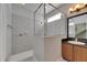 Shower and vanity with granite counters in the bathroom at 21744 Waverly Shores Ln, Land O Lakes, FL 34637