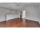 Bedroom with hardwood floors, ceiling fan, and an open loft area at 21744 Waverly Shores Ln, Land O Lakes, FL 34637