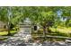 Charming single-Gathering home featuring lush landscaping, a two car garage, and inviting curb appeal at 21744 Waverly Shores Ln, Land O Lakes, FL 34637