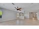 Open-concept living area with tile floors and natural light at 21744 Waverly Shores Ln, Land O Lakes, FL 34637