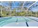 Community pool featuring enclosed screen with a beautiful blue sky and pool at 21744 Waverly Shores Ln, Land O Lakes, FL 34637