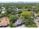 An aerial view of the home in a mature neighborhood with trees at 3411 N 12Th St, Tampa, FL 33605