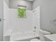 Clean, bright bathroom features a shower-tub combination and modern fixtures at 3411 N 12Th St, Tampa, FL 33605