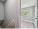 This bedroom features natural light, gray walls, and hard surface flooring at 3411 N 12Th St, Tampa, FL 33605