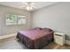 Cozy bedroom with a window providing natural light and wood-look flooring at 3411 N 12Th St, Tampa, FL 33605