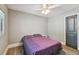 Comfortable bedroom with wood floors, a window, and a neutral color scheme at 3411 N 12Th St, Tampa, FL 33605