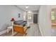 Inviting living room with gray walls, modern furnishings, and ample natural light at 3411 N 12Th St, Tampa, FL 33605