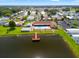 Aerial view of community amenities including pool, lake access and ample parking at 34150 Estates Ln, Wesley Chapel, FL 33543