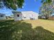 Spacious backyard with room for recreation and relaxation in a residential community at 34150 Estates Ln, Wesley Chapel, FL 33543