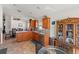 Open concept kitchen with granite counters, breakfast nook and wood cabinetry at 4247 Balmoral Ct, Wesley Chapel, FL 33543