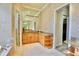 Well-lit bathroom featuring granite countertops, framed mirrors, and ample vanity storage at 441 Lucerne Ave, Tampa, FL 33606