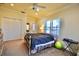 Bright bedroom with shuttered windows, ceiling fan, and closet with ample storage at 441 Lucerne Ave, Tampa, FL 33606